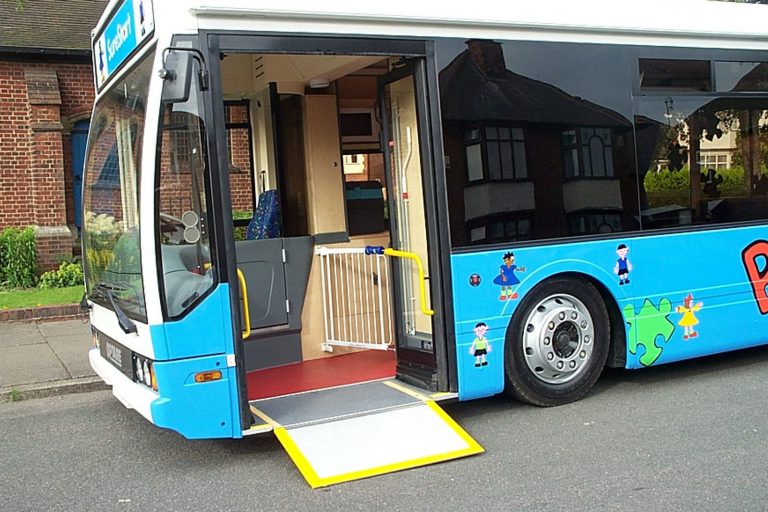 Converted bus with wheelchair ramp