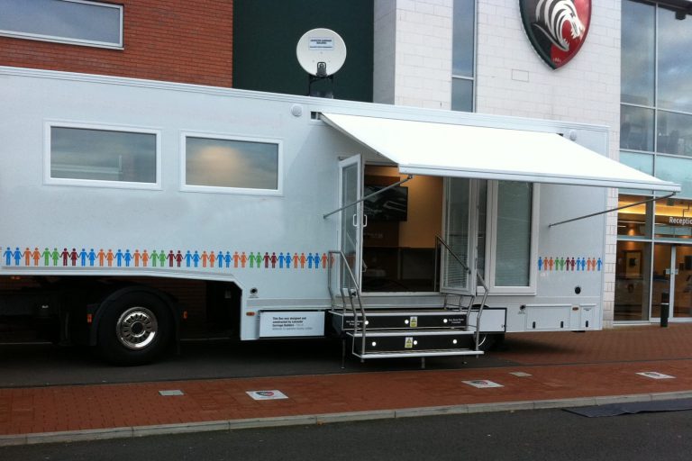 Entrances for roadshow vehicles vary and this one shows just steps and glazed doors
