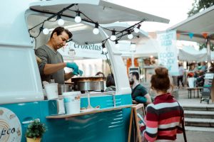 food truck based on a van and shoung a counter and opening hatch cover
