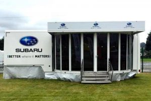 articulated exhibition trailer set up at show for Subaru cars