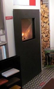 log burner inside of a display van