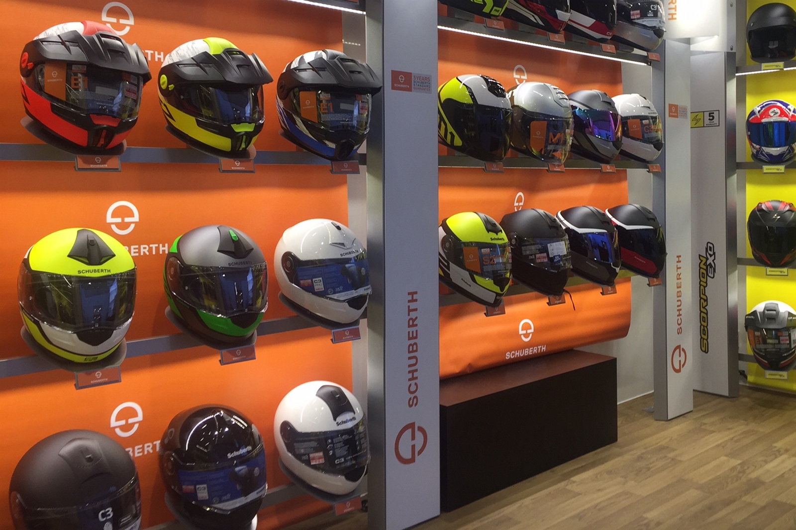 rows of crach helmets inside of a display van