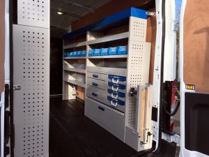 a racking system inside of a large van
