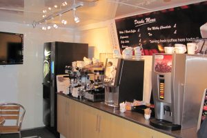product sampling vehicle interior with view of vending machines for coffee