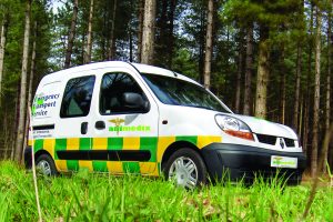 a pet taxi in a woodland setting