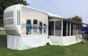 The front nearside of the exhibition trailer which shows the extension pod in position