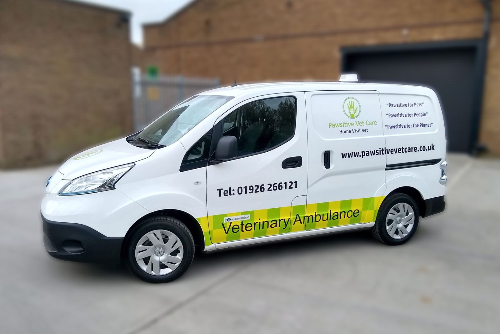 A nissan electric van seen from the nearside and fitted out as a mobile home visit veterinary vehicle. One of many electric vans converted by MVTech