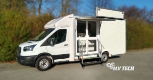 A photo of a ford transit chassis cab fitted with a box body in white that it to be used for community welfar activities