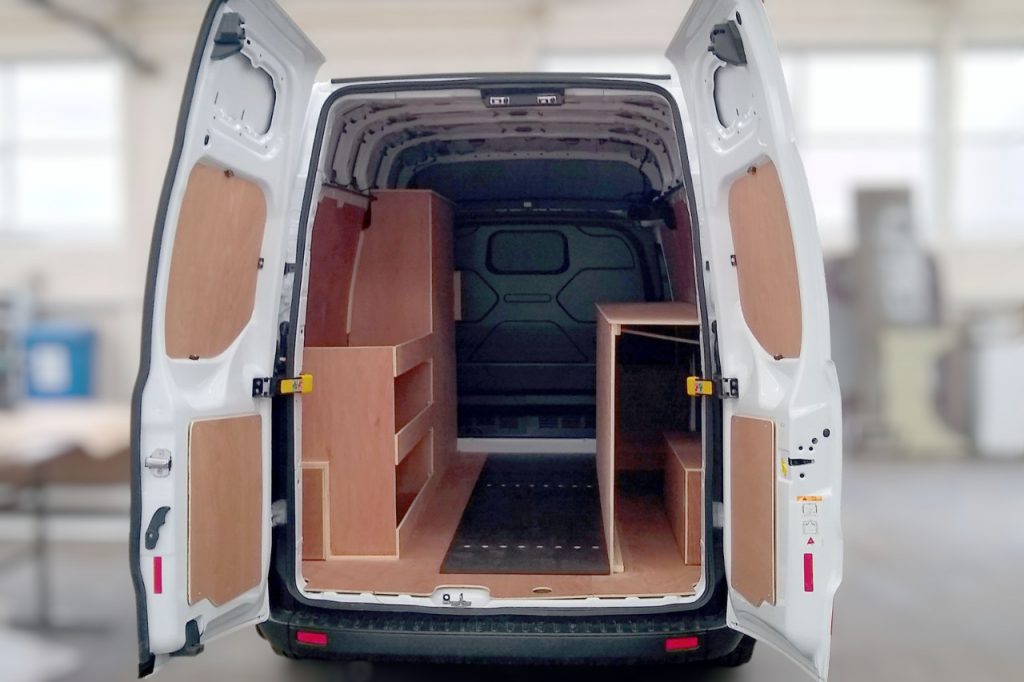 looking into the rear of a van with ply van lining fitted