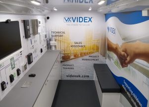 Interior of a mobile product demonstration vvehicle with seating and product displays