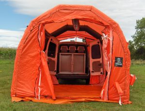 As part of our dog van conversions for business and pleasure we have produced this unusual combination of an inflatable tent attached to a dog van designed for dog rescue and treatment in disaster zones.