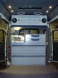 Interior of a van to be used by a dog hotel to transport "guests" to and from the hotel.