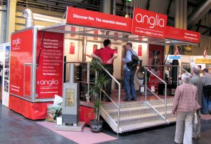 A simple expanding vehicle and trailer design ideal for use as an exhibition stand..