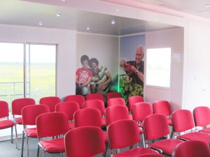 The interior of an expandable trailer is designed to support large-audience presentations and is an example of the versatility of our range of expandable vehicles and trailers
